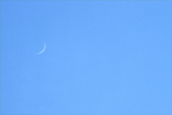 moon and venus with old mill